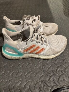 adidas Light Gray Knit Running Shoes with Orange Stripes and Teal Heel